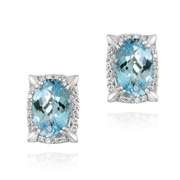 Rhodium Plated 8.8ct Blue Topaz & CZ Oval Earrings