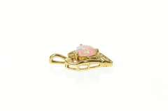10K Yellow Gold Heart Syn. Opal CZ Accent Love Symbol Pendant