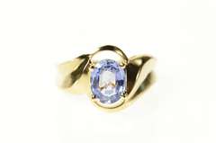 14K Yellow Gold Oval Tanzanite Solitaire Curvy Bypass Ring