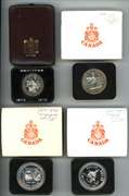 4 diff. Canadian Silver Dollars. Original boxes 1970-75