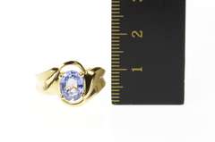 14K Yellow Gold Oval Tanzanite Solitaire Curvy Bypass Ring