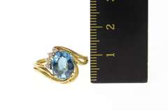 14K Yellow Gold Blue Topaz Diamond Accent Orante Bypass Ring