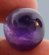 Glistening 17.89ct untreated Amethyst cabochon