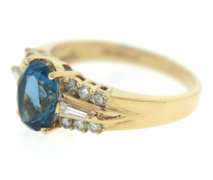 Charming Blue Topaz and Diamond Yellow Gold Ring