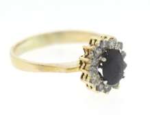 Stylish Yellow Gold Oval Sapphire & Round Diamond Halo Ring