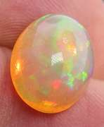 Phenomenal full spectrum flashing 4.68ct semi-black Opal