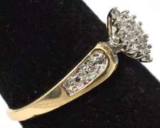 Elegant Diamond Accent Cluster Ring in Yellow Gold