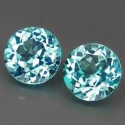Eye clean 7.02ct round brilliant cut Topaz pair