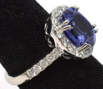 Pretty Tanzanite & Diamond Halo Ring in Platinum