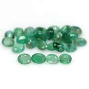 Rich emerald green 6.99ct 26pc emerald set