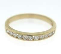 Elegant 14kt Yellow Gold Channel Set Diamond Band