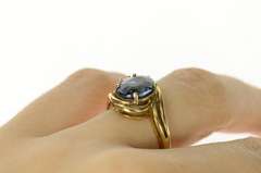 14K Yellow Gold Blue Topaz Diamond Accent Orante Bypass Ring