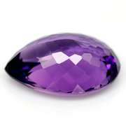 Pear cut 22.41ct royal purple created Amethyst