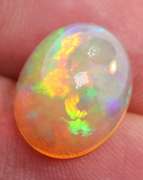 Phenomenal full spectrum flashing 4.68ct semi-black Opal