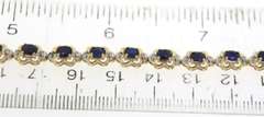 Stunning Blue Sapphire and Diamond Flower Tennis Bracelet