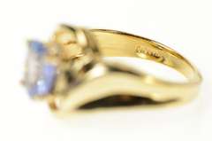 14K Yellow Gold Oval Tanzanite Solitaire Curvy Bypass Ring