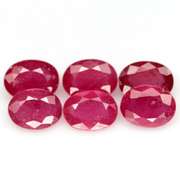 Heavy 9.50ct oval cut Ruby set