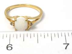 Charming Opal Ring in Yellow Gold