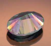Rainbow color 7.31ct concave cut Mystic Quartz
