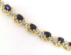 Stunning Blue Sapphire and Diamond Flower Tennis Bracelet