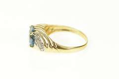 10K Yellow Gold Oval Blue Topaz Diamond Twist Statement Ring