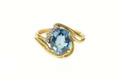 14K Yellow Gold Blue Topaz Diamond Accent Orante Bypass Ring