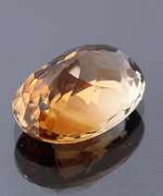 Glittering 7.77ct oval cut Imperial Topaz