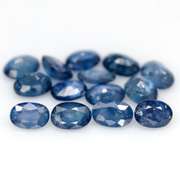 Stunning ink blue 8.37ct oval Sapphire set