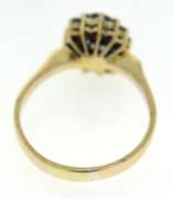 Stylish Yellow Gold Oval Sapphire & Round Diamond Halo Ring