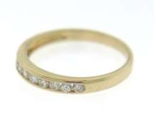 Elegant 14kt Yellow Gold Channel Set Diamond Band