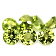Fantastic 3.27ct 4.5mm round brilliant cut Peridot set
