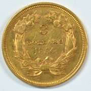 Nearly BU 1854 US $3 Gold Piece. Rare and attractive.