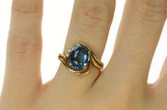 14K Yellow Gold Blue Topaz Diamond Accent Orante Bypass Ring
