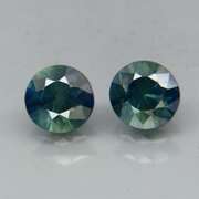 Unheated! .98ct diamond cut blue green Sapphire set