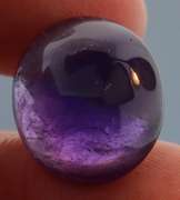 Glistening 17.89ct untreated Amethyst cabochon