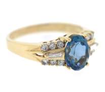 Charming Blue Topaz and Diamond Yellow Gold Ring