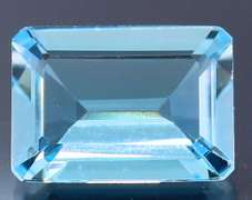 Very clean 10x14mm 7.52ct emerald cut Topaz