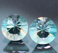 Highly prismatic! Concave cut 2.82ct Zircon set
