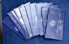 Lot OF 10 Ike Silver Dollars UNC in The Blue Envelopes