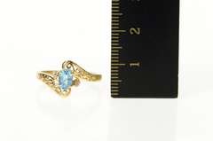 14K Yellow Gold Blue Topaz Diamond Accent Scroll Bypass Ring