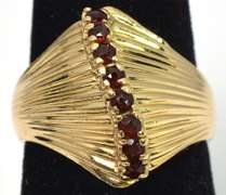 Interesting Textured Garnet Ring in 14KT Yellow Gold