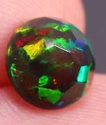 Vibrant 1.55ct ribbon pattern Black Opal solitaire