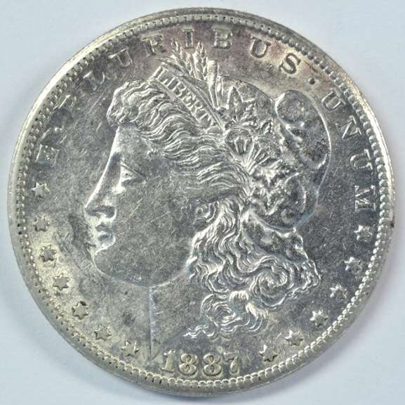 Real flashy near Mint 1887-S Morgan Silver Dollar. Key