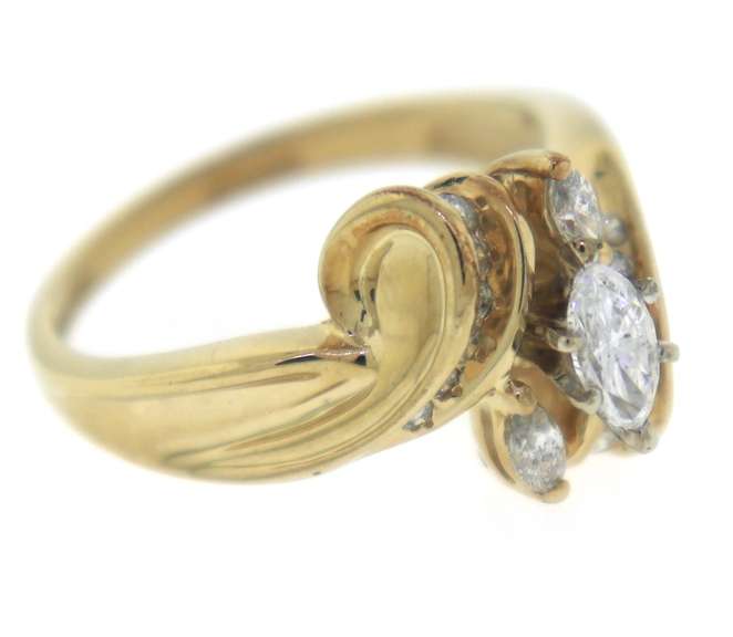 Goregous Marquise & RBC Diamond Ring