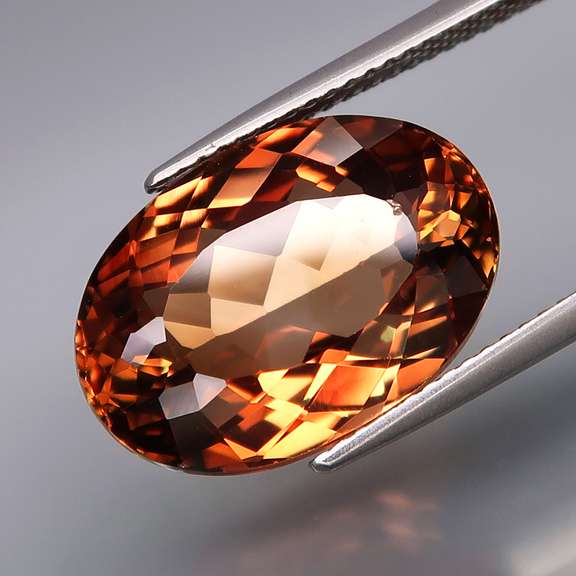 Lavish 13.87ct oval cut Imperial Topaz