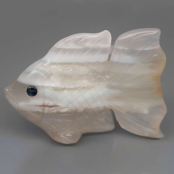 Gorgeous 86.78ct striped Agate and Sapphire carving