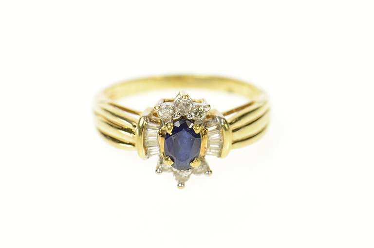 10K Yellow Gold Oval Sapphire Baguette Diamond Halo Ring