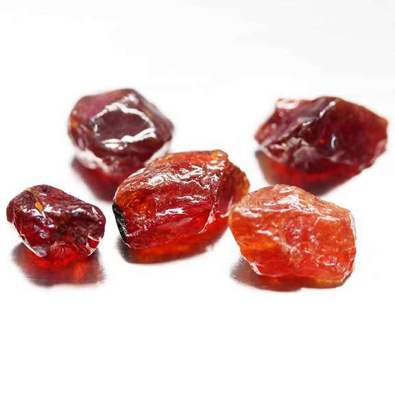Heavy 27.97ct uncut Garnet set