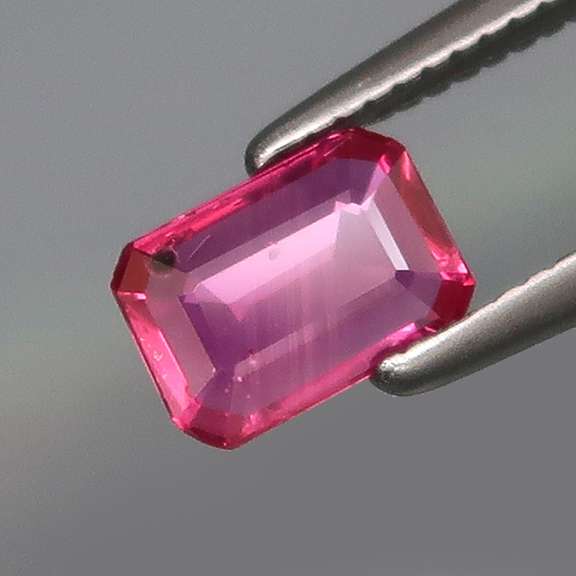 High quality .54ct emerald cut Ruby solitaire