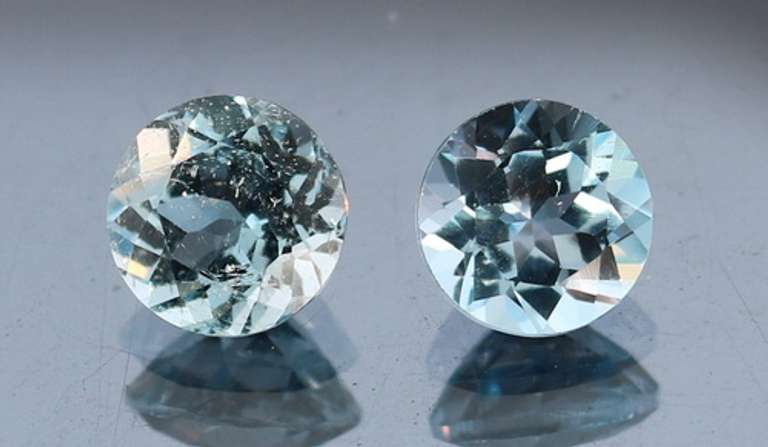 Heavy 5ct vivid sky blue Topaz set